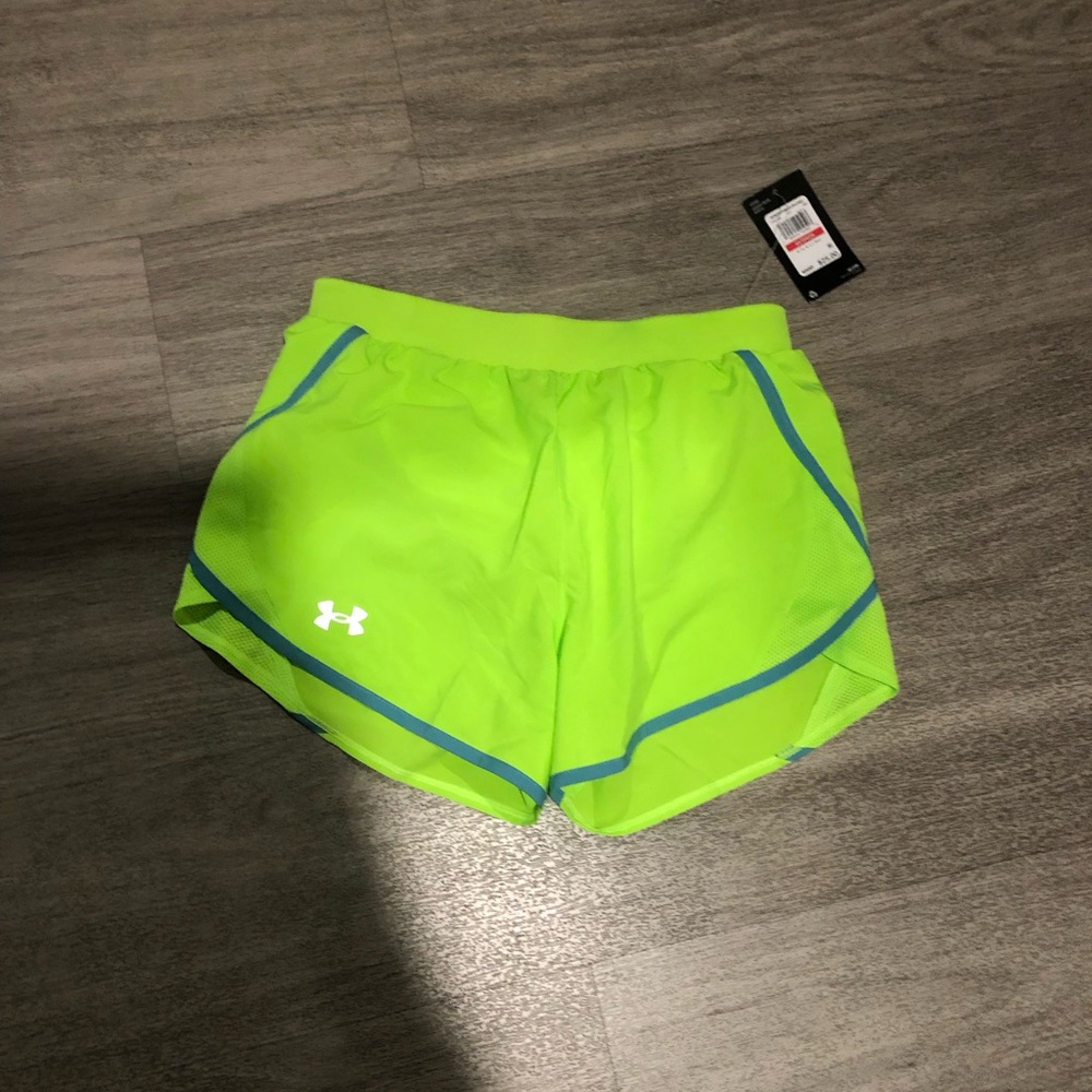 NWT Under Armour running shorts XS 
Neon green
